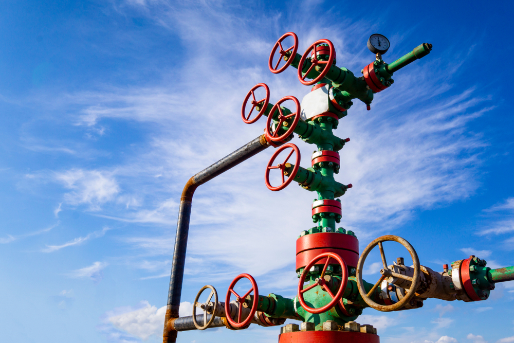 Oil wellhead Christmas tree with valves used for pressure control and flow regulation